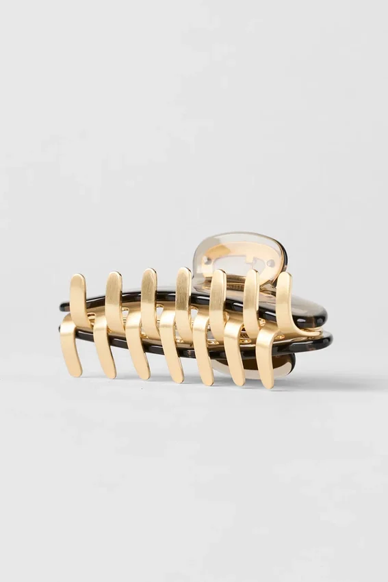 Akrylklämma i illusion-stil – grusfärgad/borstat guld