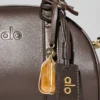 Alo Mini Odyssey – espressofärgat läder