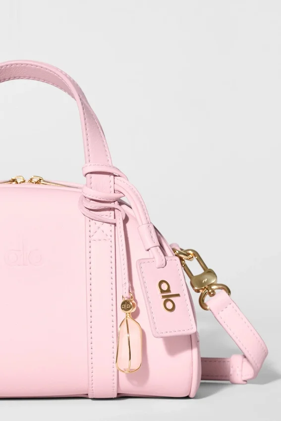 Alo Mini Odyssey – solblekt rosa läder