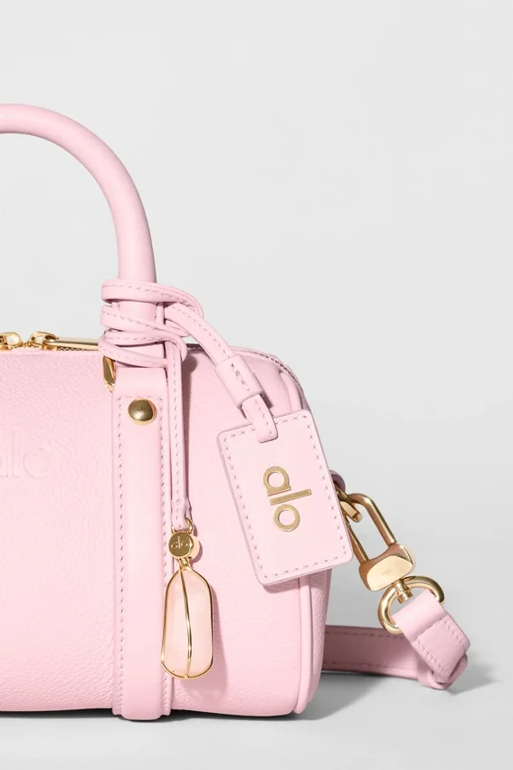 Alo Mini Voyage – solblekt rosa läder