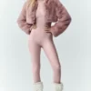 Chic kort jacka i fuskpäls – rosa champagne