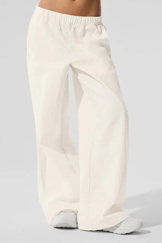 High-Waist Origin-träningsbyxor med vida ben – elfenben