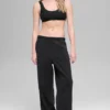 Joggingbyxor i polarfleece med High-Waist-design – svart