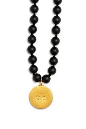 Mala-halsband i svart onyx
