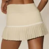 My Serve-tenniskjol i bomull och kashmir med High-Waist-modell – sandbeige/vit
