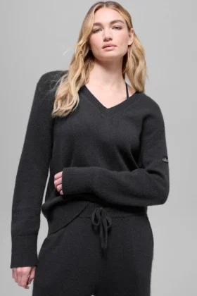 Oversized stickat plagg med V-ringning i ull och kashmir från New Class – svart