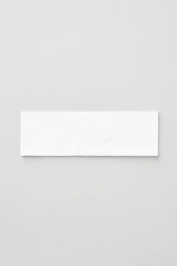 Performance Conquer-pannband – vitt