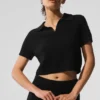 Polo-T-shirt i kashmir med plüschvaffelmönster – svart