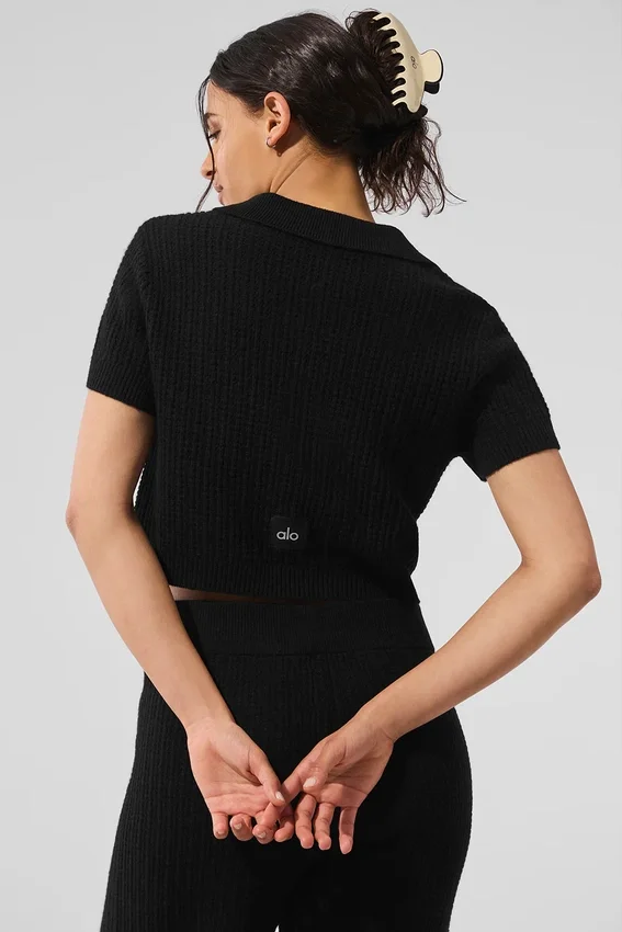 Polo-T-shirt i kashmir med plüschvaffelmönster – svart