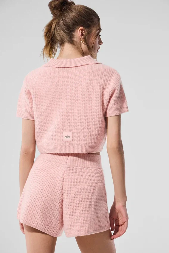 Polo-T-shirt i mjuk kashmir med våffelmönster – rosa kvarts