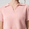 Polo-T-shirt i mjuk kashmir med våffelmönster – rosa kvarts