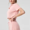 Polo-T-shirt i mjuk kashmir med våffelmönster – rosa kvarts