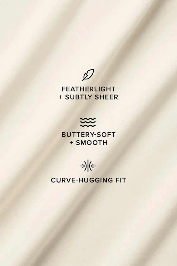 Asymmetrisk Sheer Glow långärmad tröja – elfenben