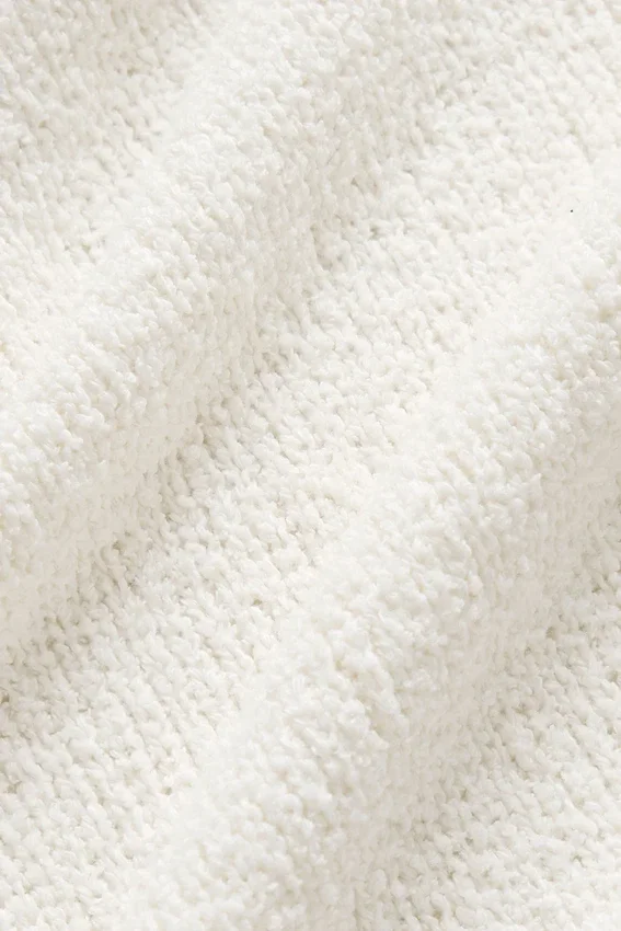 Strickad långärmad polotröja med struktur – elfenben