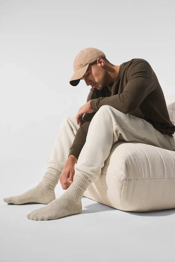 Unisex-strumpor i ull och kashmir med lätt frostad yta – vinterlatte/elfenben